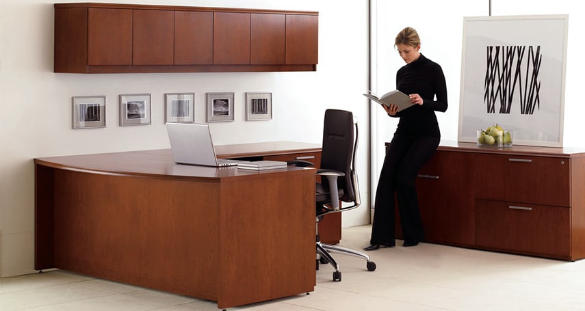 Woman standing at desk